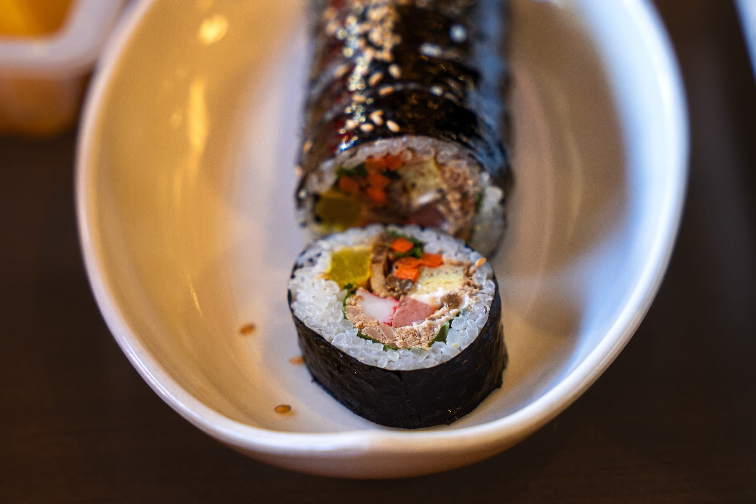 A close-up of a kimbab roll