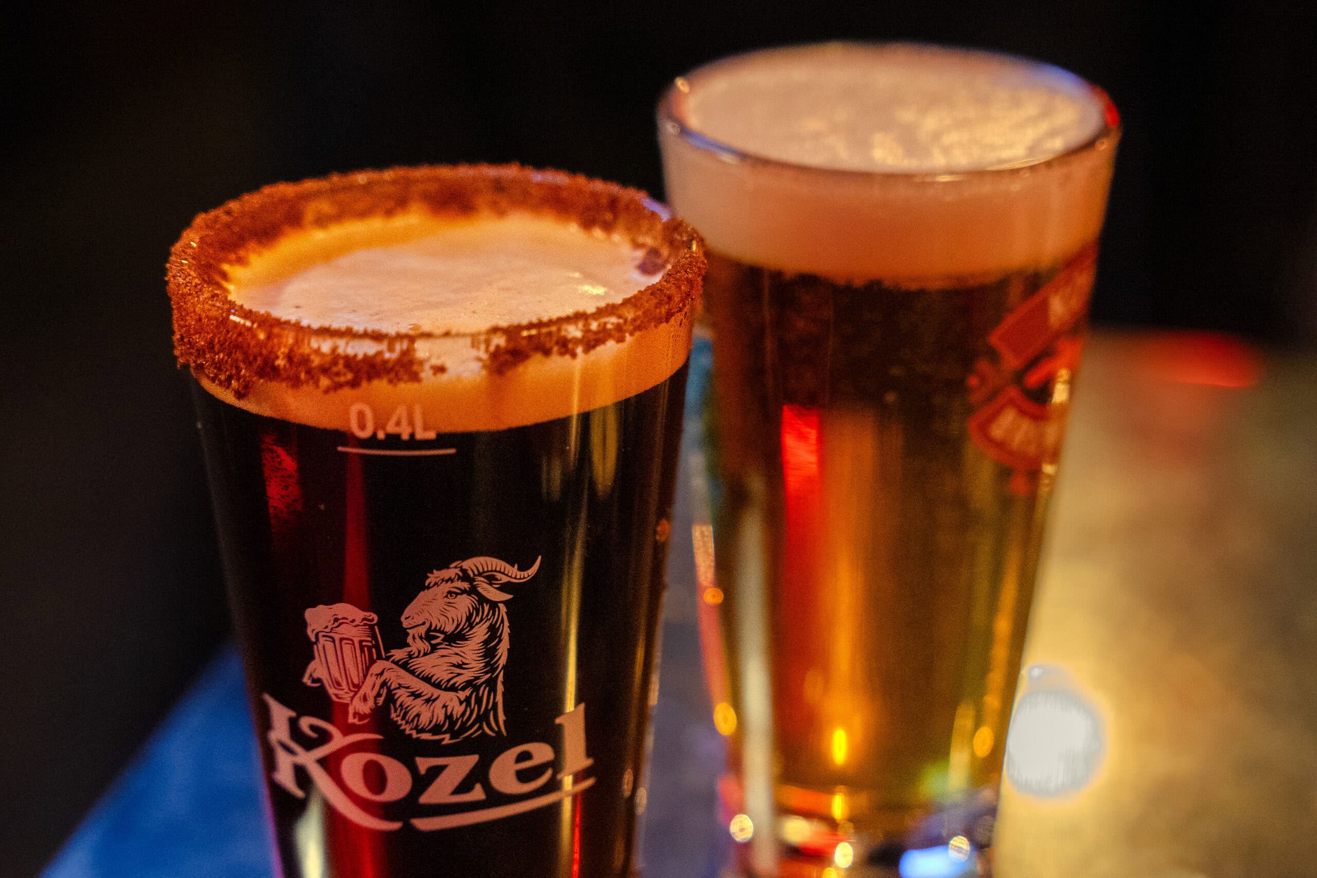 a 400 ml glass of dark Kozel beer, with the rim trimmed in sugar cinnamon at Dallas Pizza in Mullae dong, Seoul