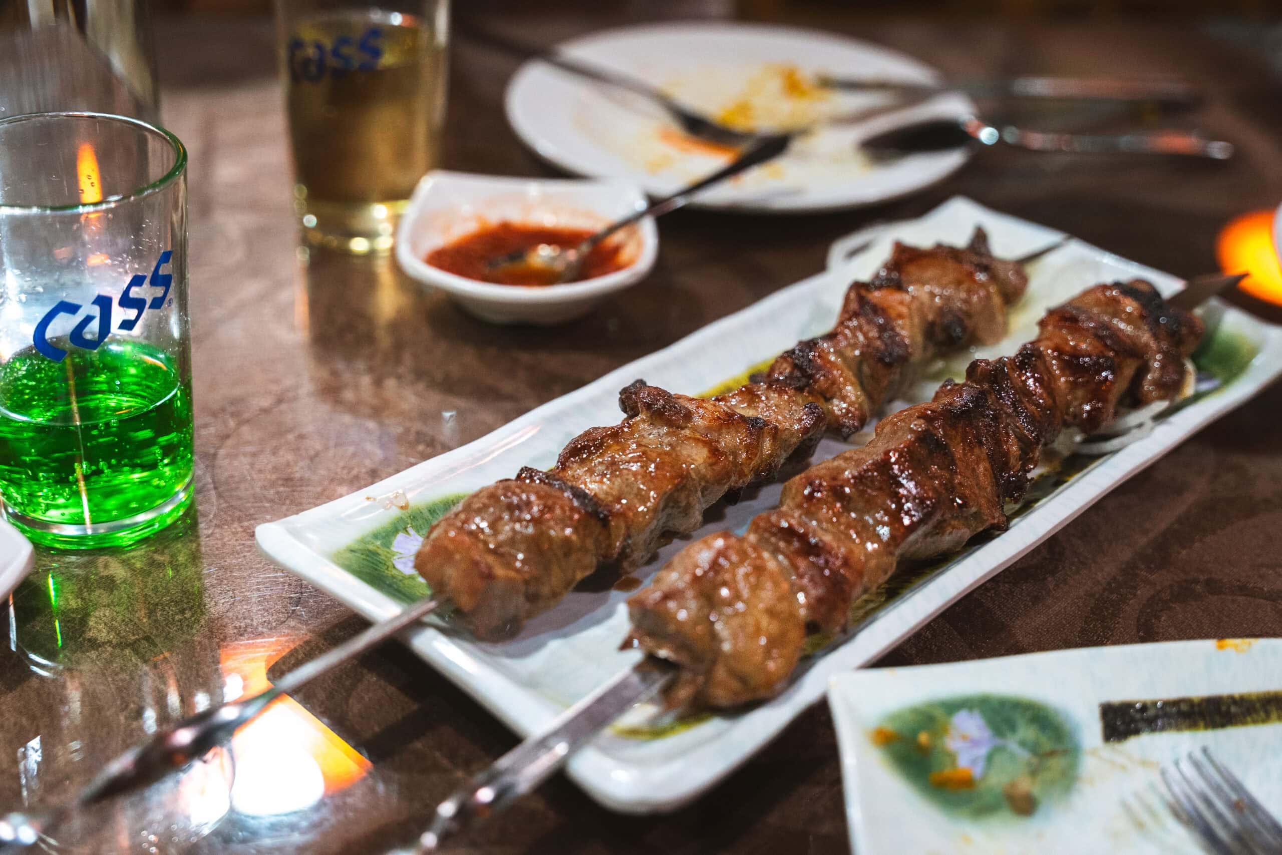 Two large, perfectly grilled shashlik (meat skewers) that we had at an Uzbek restaurant in Dongdaemun